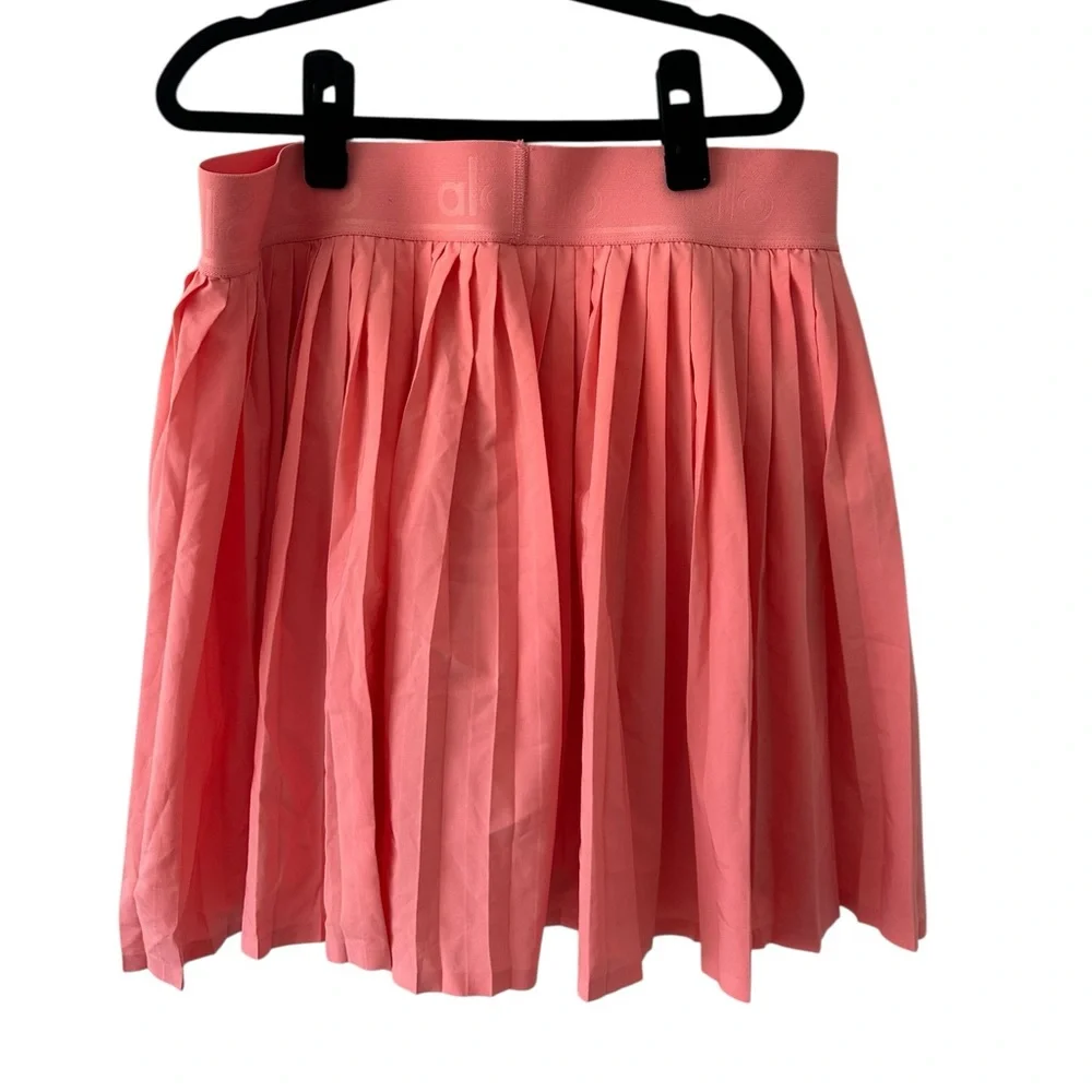 ALO Yoga Pleated Mini Skort in Coral Pink